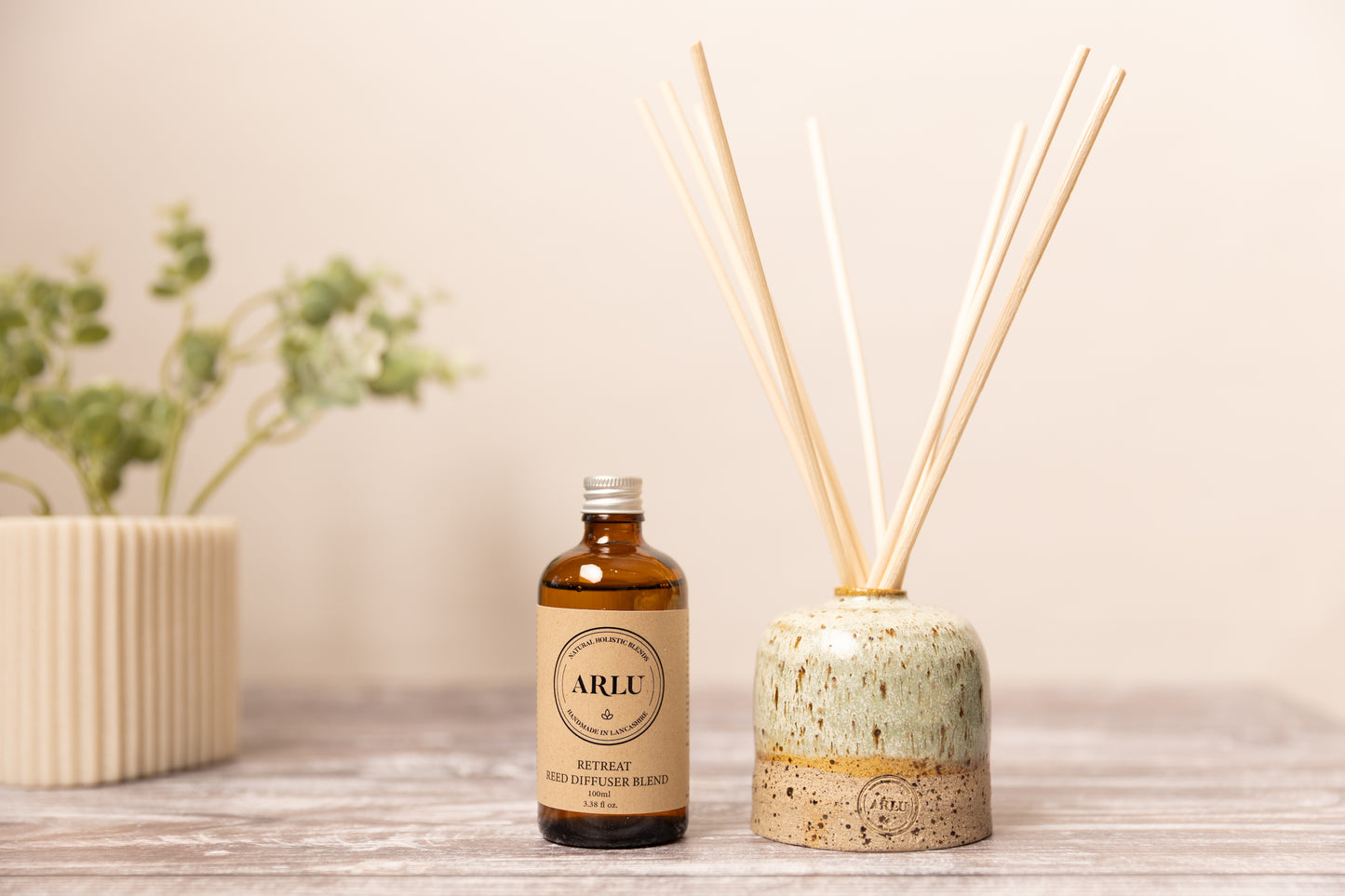 Aromatherapy reed diffuser with handmade pot